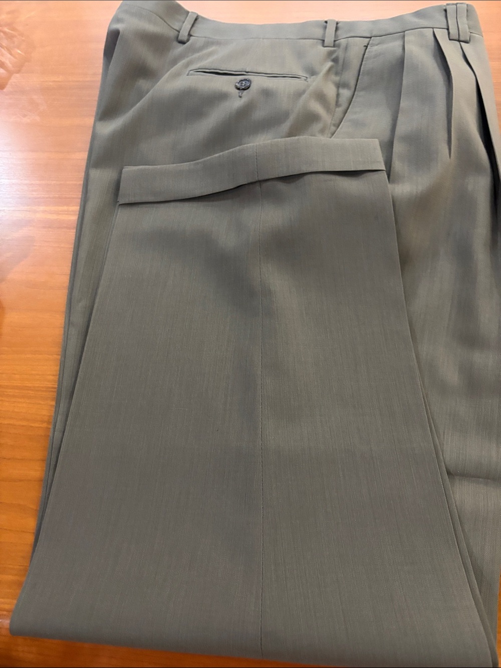 Men's dark Olive Green Dress Pants. Very fine fabric. 100% pure wool. Cuff hem.